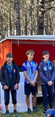 Students Race Through Terrain In NZSS Orienteering.